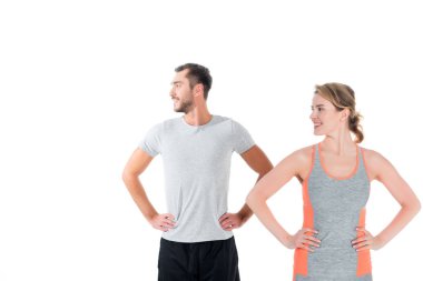 Sportif çift üzerinde beyaz izole eğitim önce ısınma portresi