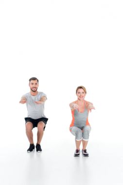 atletik iki spor giyim sit yapıyor sonra üzerine beyaz izole ups