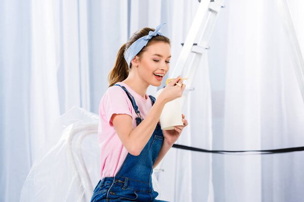 happy girl eating noodles with closed eyes
