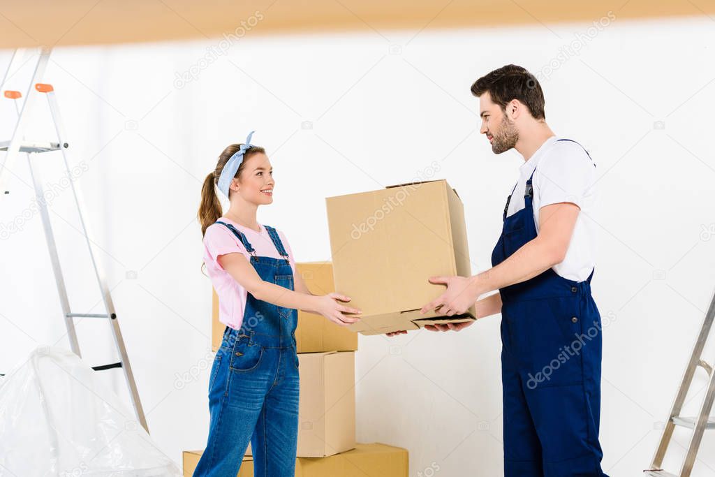 relocation service worker giving box to girl