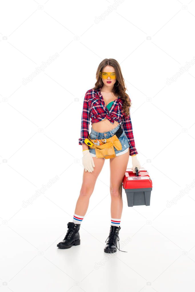 beautiful sexy girl posing with tool belt and toolbox, isolated on white