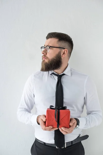 Portrait Pensive Businessman Wrapped Present Hands Isolated White — Stock Photo, Image