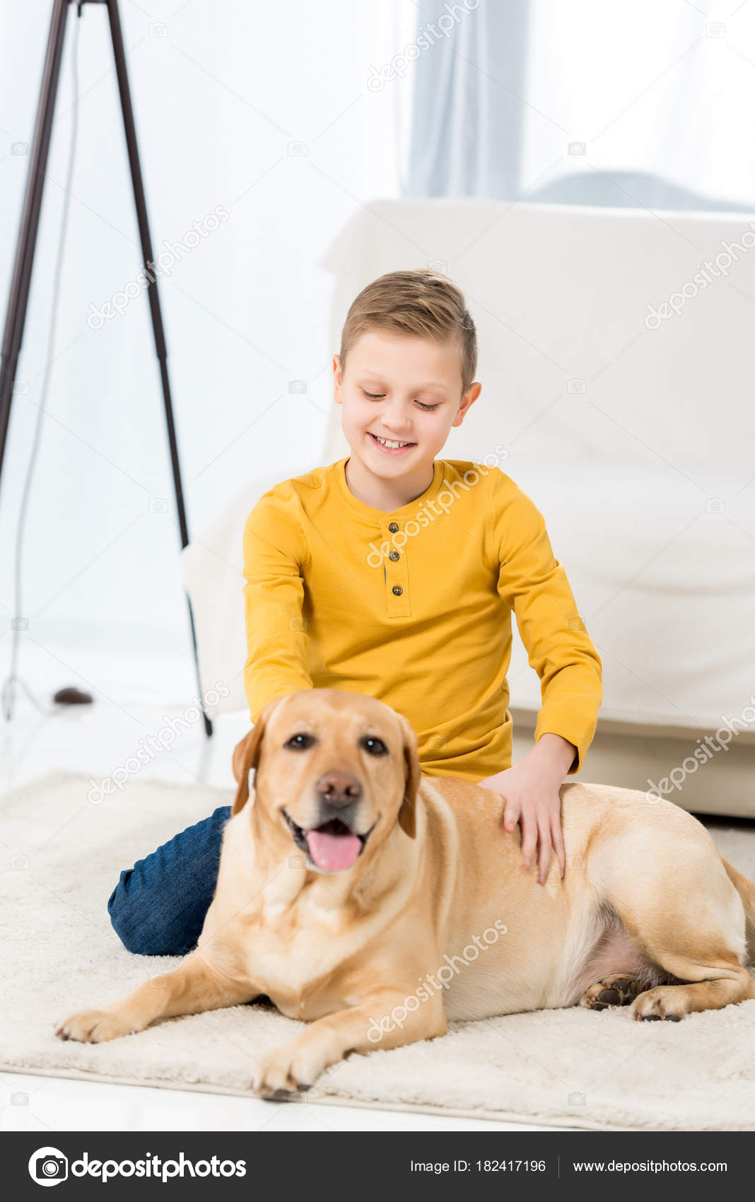 Happy Little Kid Petting His Dog While Sitting Floor — Stock Photo
