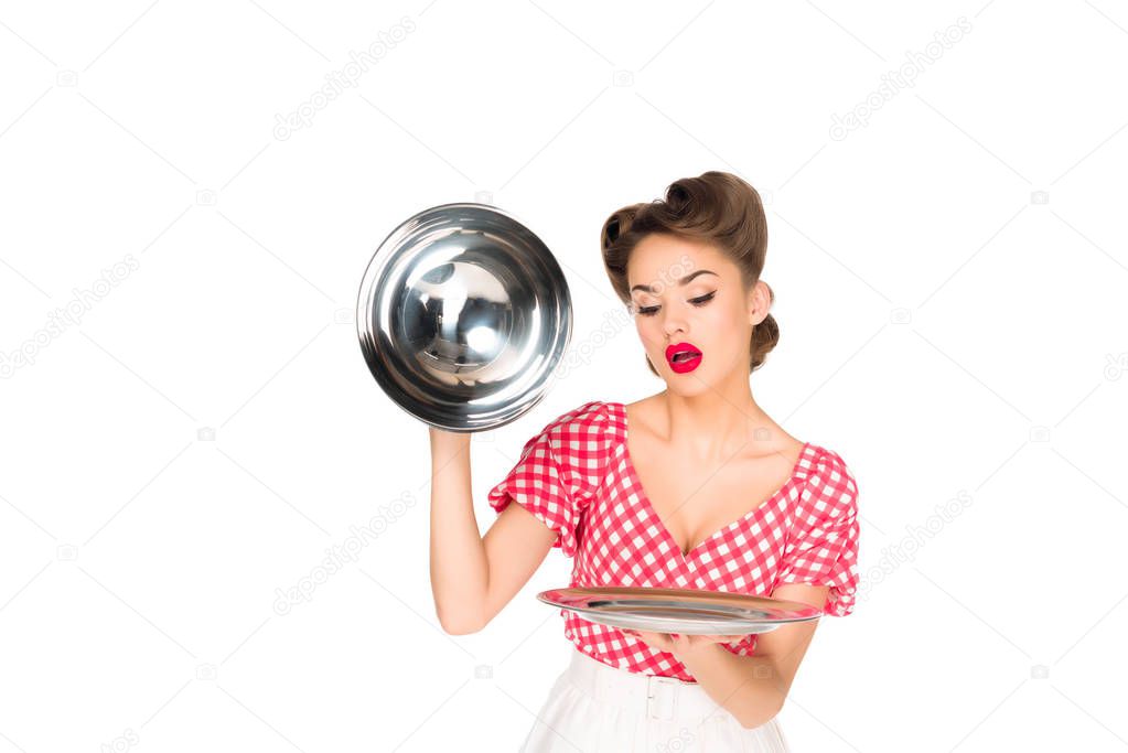portrait of beautiful young woman in retro clothing with empty serving tray in hands isolated on white
