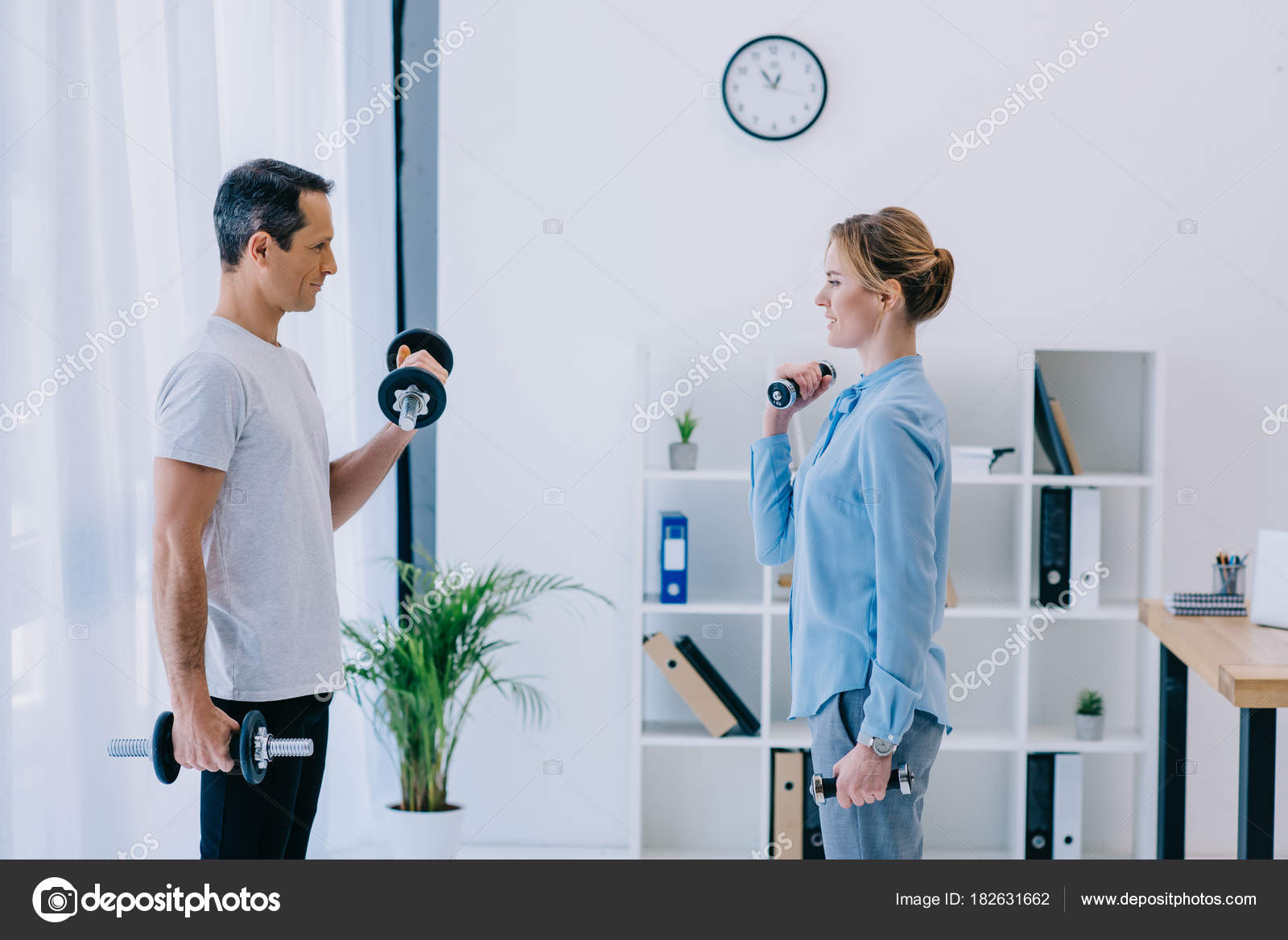 Side View Businesswoman Her Personal Trainer Working Out Dumbbells