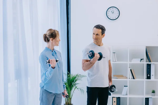 Attractive Businesswoman Her Personal Trainer Working Out Dumbbells Office — Stock Photo, Image
