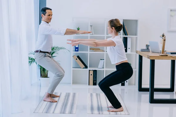 Side View Businessman His Trainer Practicing Yoga Awkward Pose Office — Stock Photo, Image