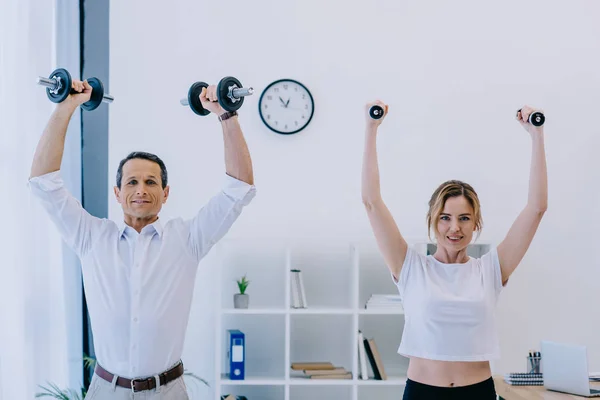 Businessman His Female Personal Trainer Working Out Dumbbells Office — Stock Photo, Image