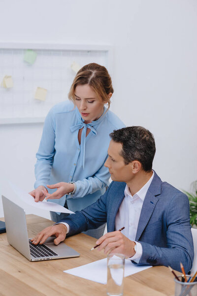 successful businesspeople working together at modern office