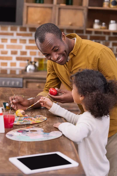 African American Father Daughter Painting Easter Eggs — Stock Photo, Image