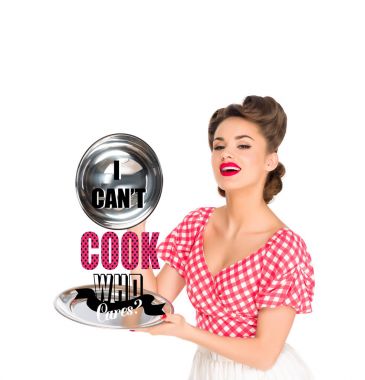 beautiful young woman in retro clothing with I CAN`T COOK, WHO CARES? lettering on serving tray in hands isolated on white clipart