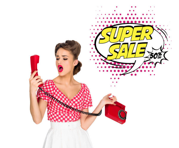 portrait of pin up woman talking on old telephone with super sale speech bubble isolated on white
