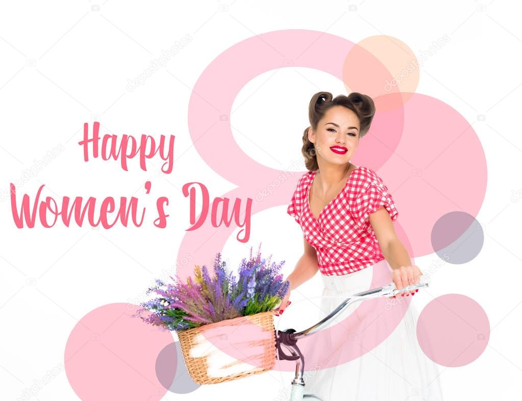happy women`s day greeting card with attractive pin up woman on bicycle with basket of flowers isolated on white