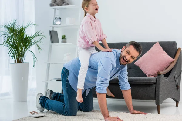 Smiling Father Little Daughter Piggybacking Together Home — Stock Photo, Image