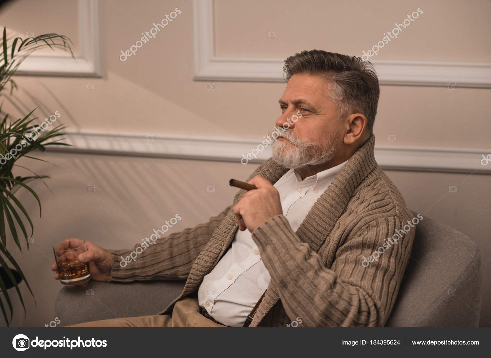 depositphotos_184395624-stock-photo-senior-man-smoking-cigar-drinking.jpg
