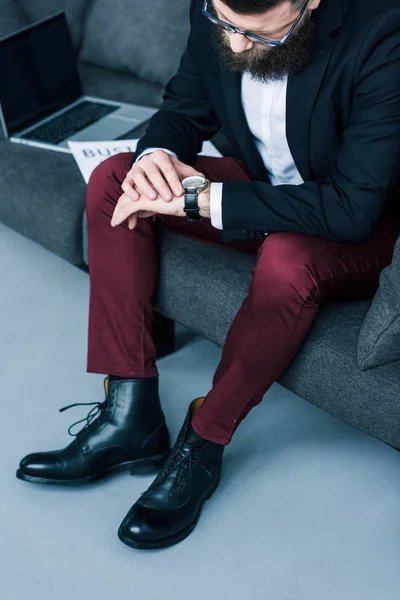 Partial View Businessman Checking Time While Sitting Sofa — Free Stock Photo