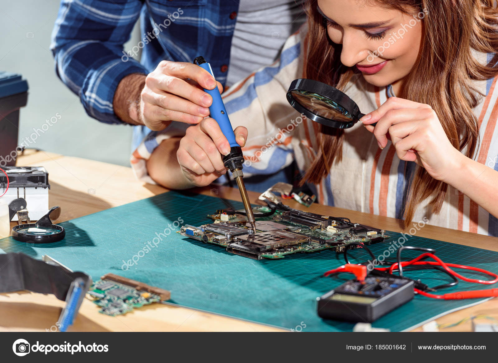 depositphotos_185001642-stock-photo-man-helping-woman-soldering-elements.jpg