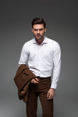 İşadamı ile ceket gri izole bir el ayakta