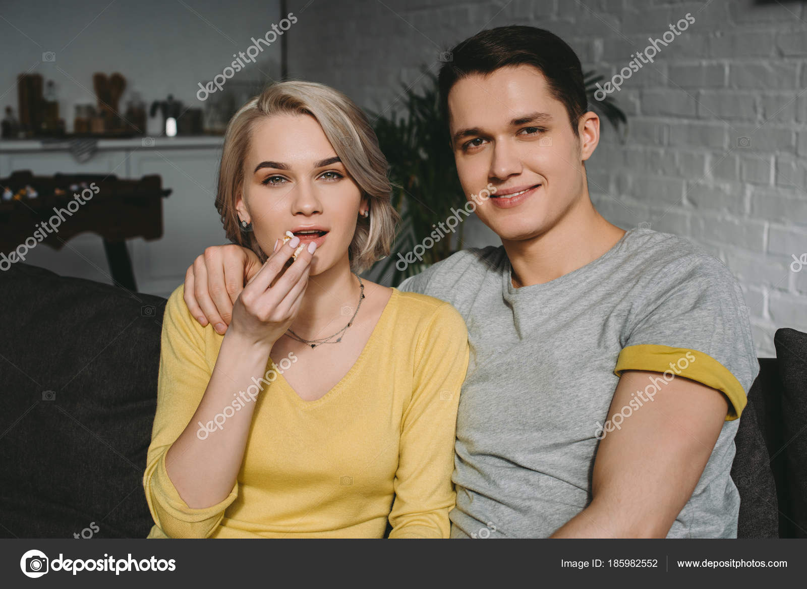 Girlfriend Eating Popcorn Looking Camera Boyfriend Stock Photo by