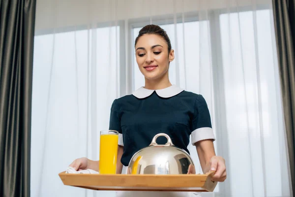 Young Smiling Maid Uniform Holding Breakfast Covered Cloche Tray — Free Stock Photo