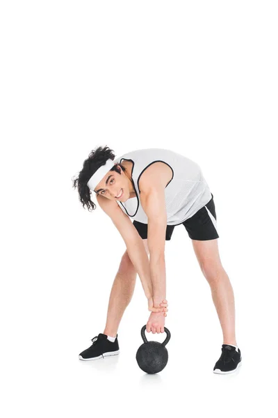 Jovem Esportista Magro Levantando Kettlebell Isolado Branco — Fotografia de Stock