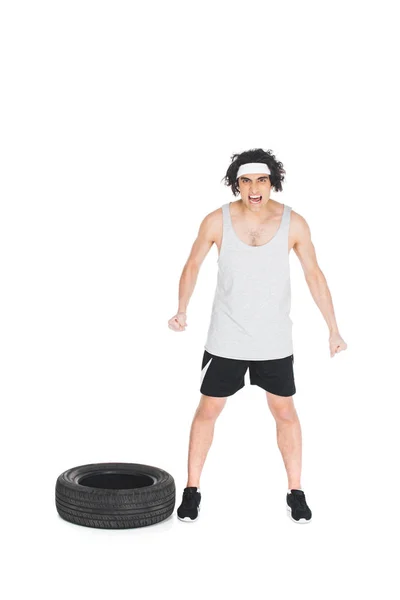 Angry Skinny Sportsman Standing Tire Isolated White — Stock Photo, Image