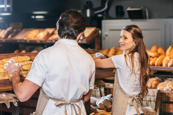 Shop Assistants Arranging Loafs Bread Supermarket — Stock Photo, Image