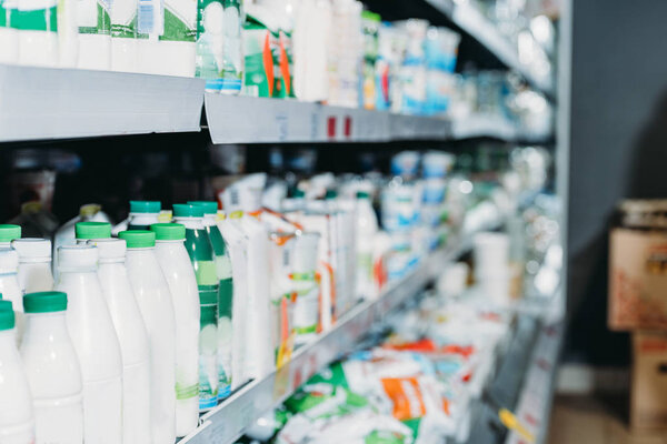 selective focus of dairy products in supermarket
