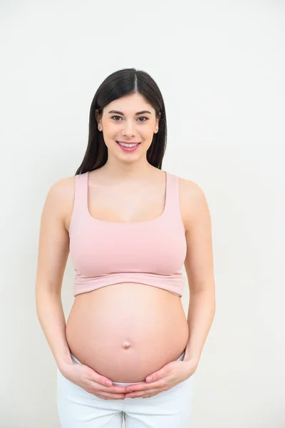 Uśmiechający Się Młoda Kobieta Ciąży Białym — Zdjęcie stockowe