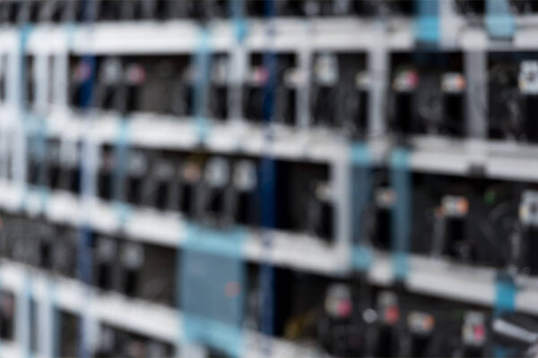 blurred shot of cryptocurrency mining farm