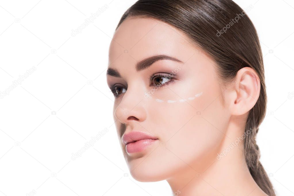 close-up shot of beautiful young woman with dotted line on face isolated on white