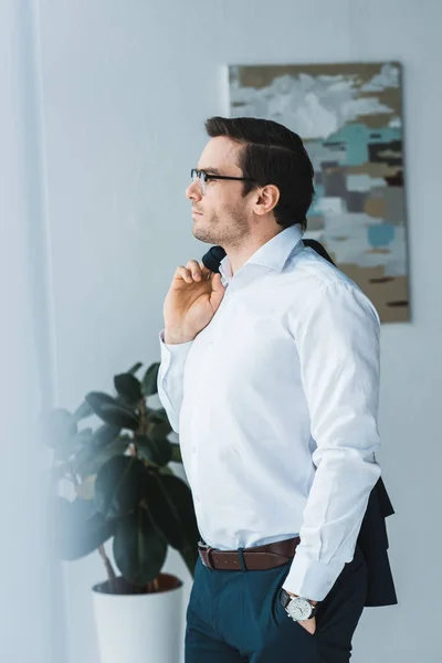 Handsome Businessman Wearing Glasses Looking Window — Free Stock Photo