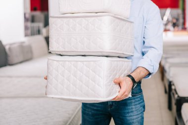 pile of folding mattresses clipart