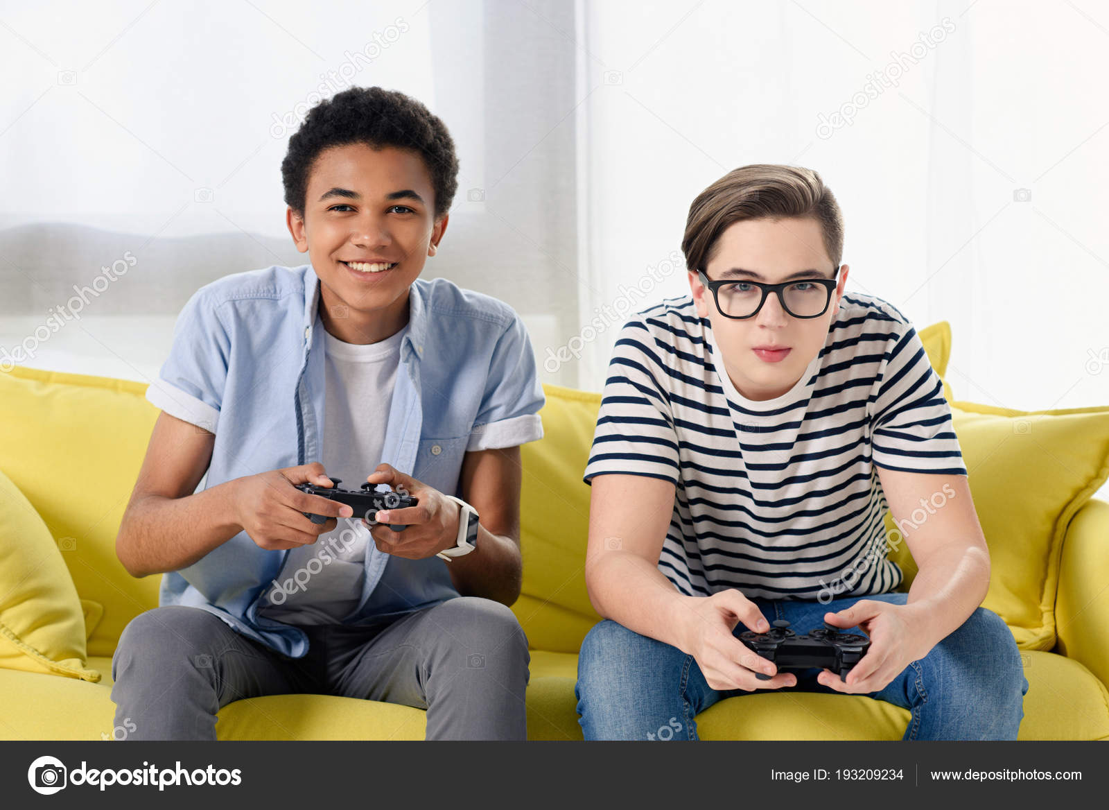 Teenager playing video games at home - Stock Photo - Masterfile - Premium  Royalty-Free, Code: 614-07768268