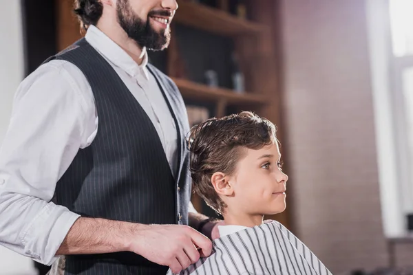 Smiling Bearded Barber Covering Adorable Little Kid Striped Cloth Kids — Stock Photo, Image