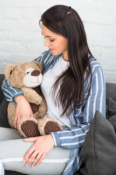 Smiling Woman Teddy Bear Resting Sofa Home — Stock Photo, Image