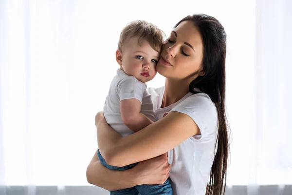 Portrait Tender Mother Holding Cute Baby Hands Home — Stock Photo, Image