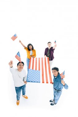high angle view of group of multiethnic teens with usa flags isolated on white clipart