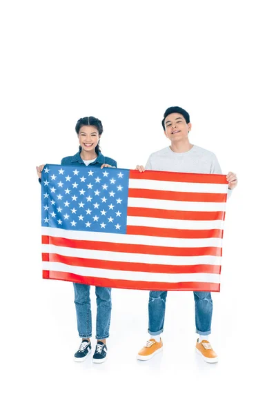 アメリカ国旗の白で隔離を保持している幸せな 代学生 — ストック写真