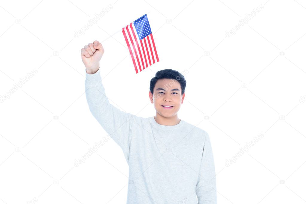 happy teen asian student boy with usa flag isolated on white