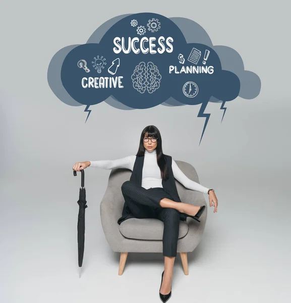 Beautiful Brunette Businesswoman Sitting Armchair Umbrella Gray Cloud Creative Success — Stock Photo, Image