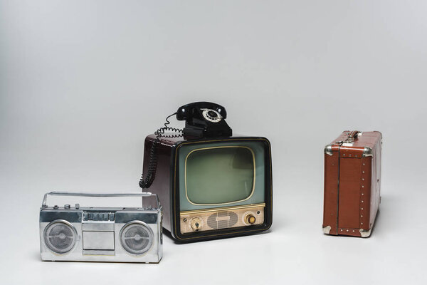 composition of various vintage objects on grey