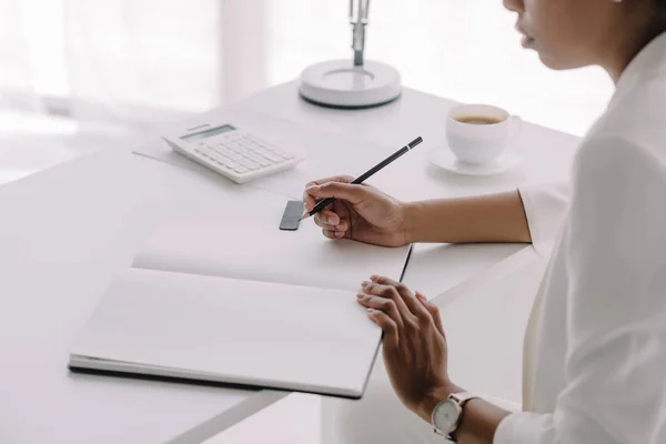 Cropped Image African American Businesswoman Writing Something Notebook Office — Stock Photo, Image