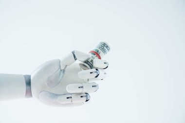 robot tutarak yakından görmek Doları banknot üzerinde beyaz izole haddelenmiş 