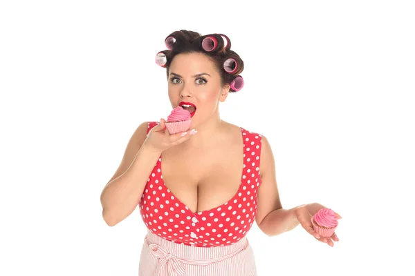 Emotional Size Woman Eating Pink Cream Cupcakes Looking Camera Isolated — Stock Photo, Image