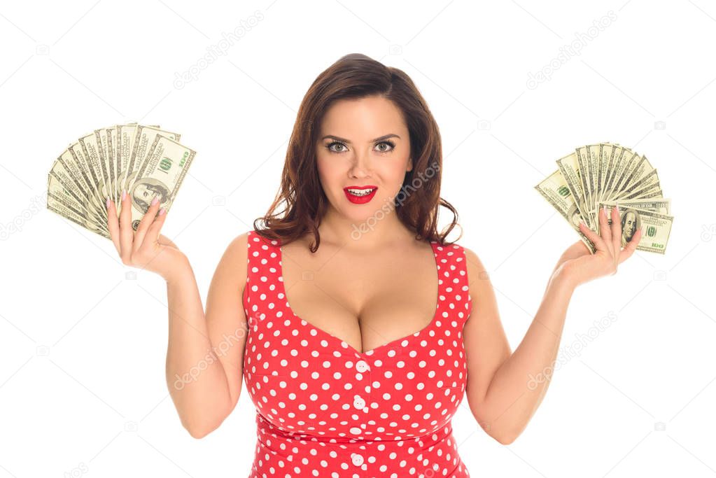 smiling plus size woman with lot of cash isolated on white