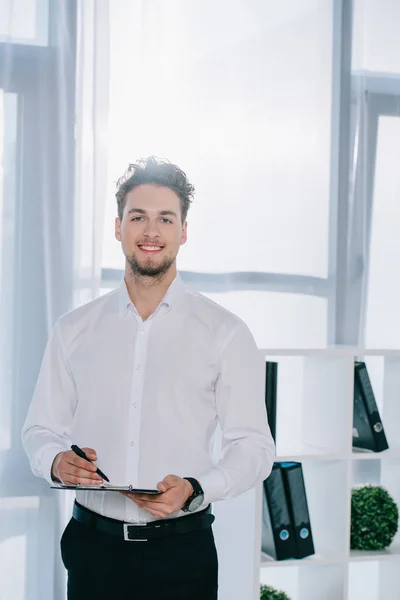 Portrait Smiling Businessman Formal Wear Notepad Office — Stock Photo, Image