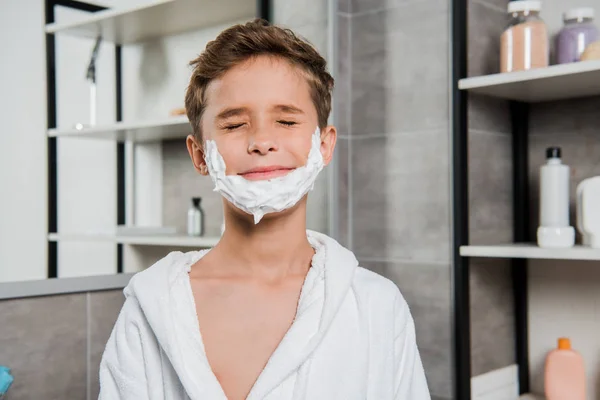 Cute Boy Closed Eyes Shaving Foam Face Bathroom — Stockfoto