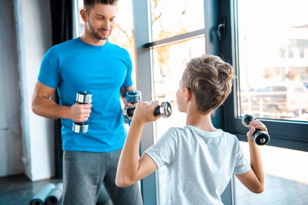Selective Focus Kid Exercising Dumbbells Handsome Father — Stock Photo, Image