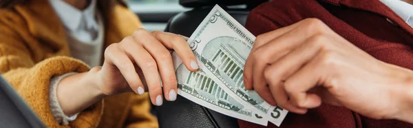 Cropped View Passenger Giving Dollar Banknotes Taxi Driver Panoramic Shot — Stock Photo, Image